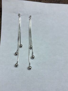 Four pairs silver pierced earrings